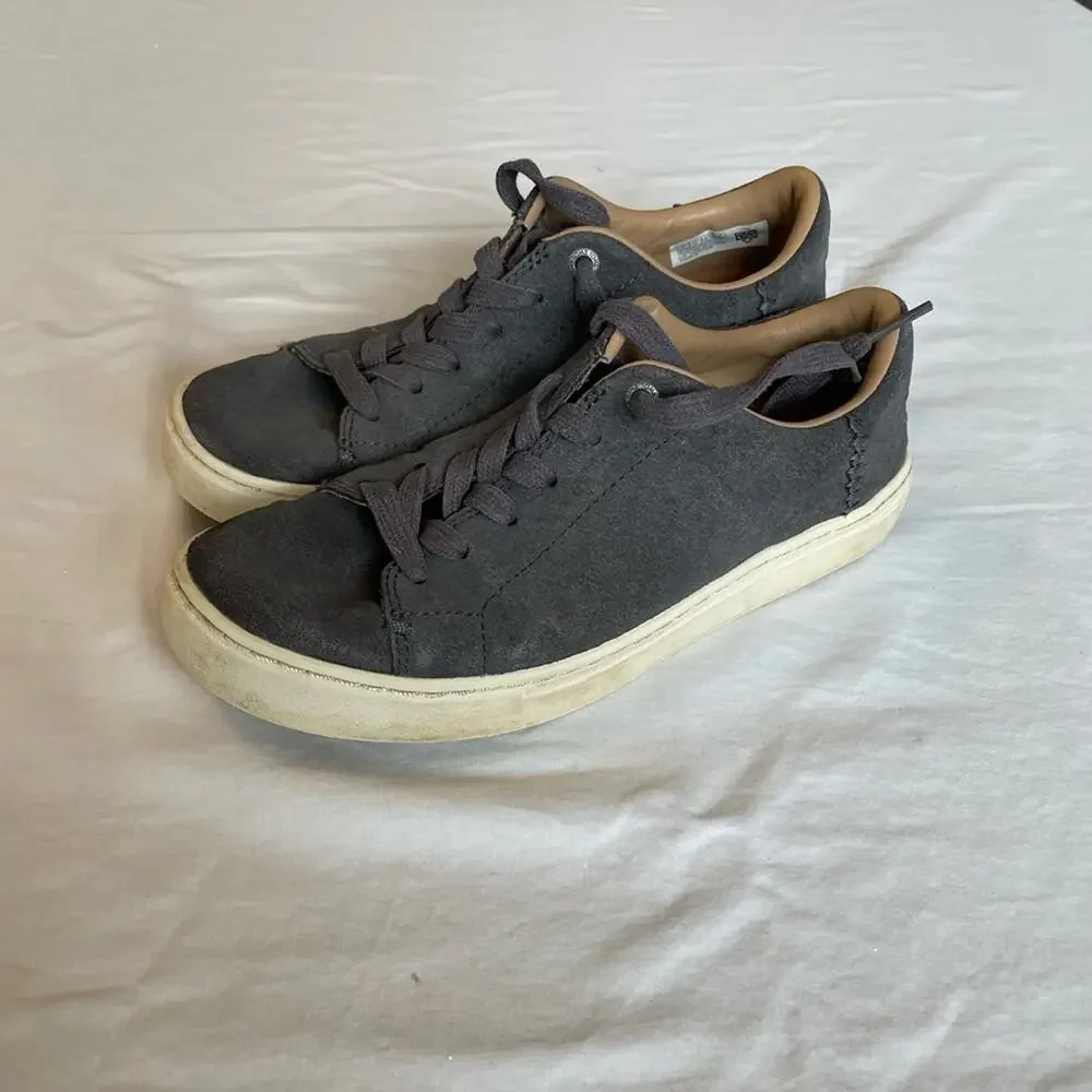 Tom’s gray suede casual sneakers.  Size 6